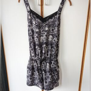 Lululemon The Runsie Flowabunga Floral Black Angle Romper Jumpsuit 8